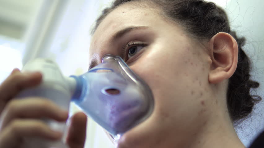 Girl In Hospital Is Treated With Inhalation, Sad Child In Hospital Breathing, cinematic dof | Shutterstock HD Video #1015480309