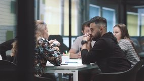 The creative team is discussing a new project. Bright contemporary small creative business. Casual young people in new creative business office or architects company. - Powered by Shutterstock - Get 15% off with code: PIKWIZARD15