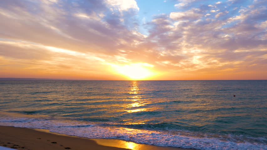Beautiful scenic sunrise on the sea. Colorful and vibrant. | Shutterstock HD Video #1015500733
