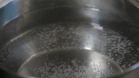 Boiling water in a kitchen pot
