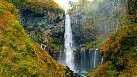 Kegon Waterfall in autumn trees colorful waterfall from lake Chuzenji in Nikko national park, Beautiful in autumn leaves (koyo) season at Tochigi ,Japan