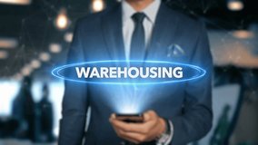 Businessman With Mobile Phone Opens Hologram HUD Interface and Touches Word - WAREHOUSING - Powered by Shutterstock - Get 15% off with code: PIKWIZARD15