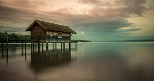Ammersee Bavaria Germany Timelapse video, view of lake at morning, sunset clouds. Beatutiful Landscapes Time lapse at night clouds over lake, Huts.