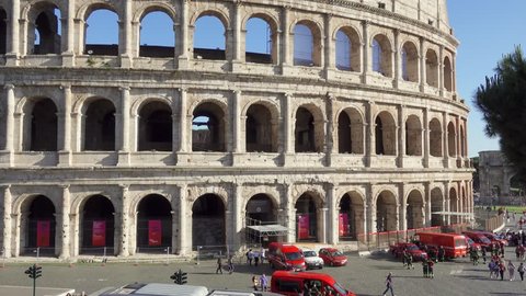 ROME, ITALY - CIRCA May 2018: Famous Italian attraction Colosseum in Rome. Veiw on ancient Flavius amphitheater Coliseum in capital of Italy. Tourists walking around