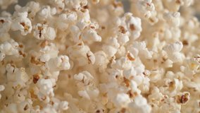 Popcorn tossed up and falling down. Shot with high speed camera, 4K. Slow Motion. - Powered by Shutterstock - Get 15% off with code: PIKWIZARD15