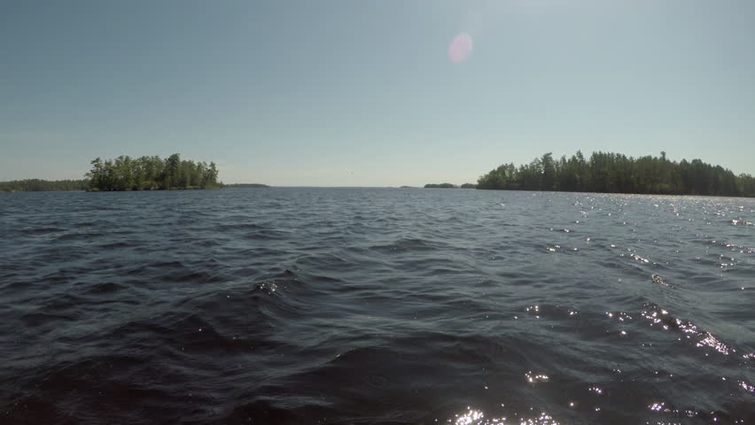 Boating Toward Islands in Rainy Lake in Minnesota