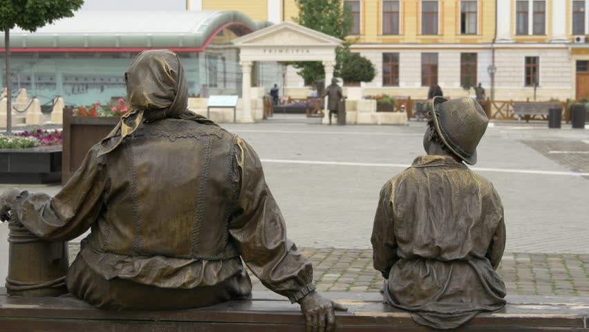 Alba Iulia, Romania - April, 2016: Bronze statue of a woman and a boy, Alba Iulia fortress