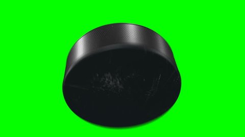 Set of 4 Videos. Beautiful Hockey Puck Hits the Camera in Slow Motion on Green Screen. Hockey 3d Animation of Flying Puck Isolated Alpha Matte. Sport Concept. 4k Ultra HD 3840x2160.