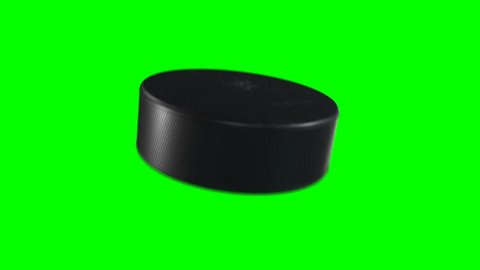 Set of 6 Videos. Beautiful Hockey Puck Shots in Slow Motion on Green Screen. Hockey 3d Animation of Flying Puck Isolated Alpha Matte. Sport Concept. 4k Ultra HD 3840x2160.