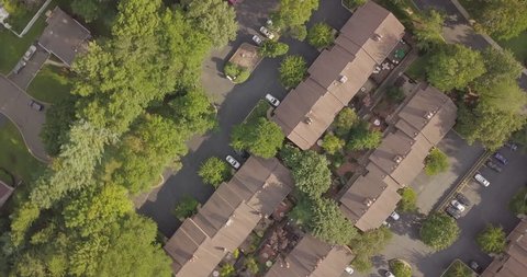 Drone Flying over apartment complex straight down overhead
