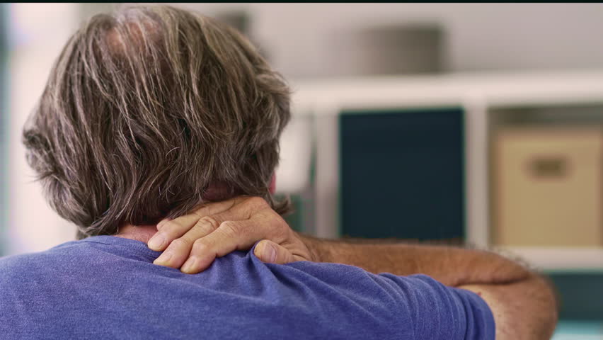 Old man with neck pain