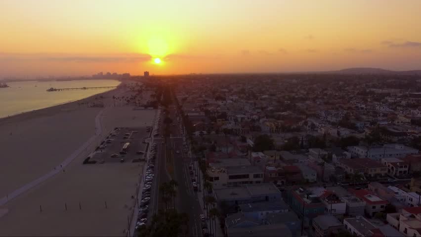 Sunset panning over beach town.