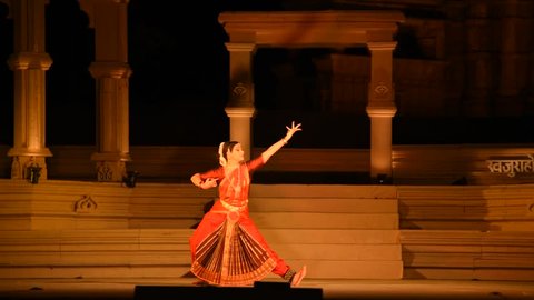 KHAJURAHO, INDIA 23 FEBRUARY 2018 : Dancers wearing traditional dresses and perform classical dance during the International Khajuraho Dance Festival it was open free for public