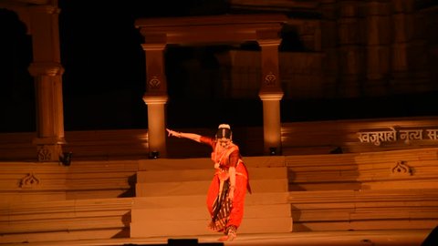 KHAJURAHO, INDIA 23 FEBRUARY 2018 : Dancers wearing traditional dresses and perform classical dance during the International Khajuraho Dance Festival it was open free for public