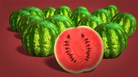 Ripe watermelons  on red background close-up. 4k video.