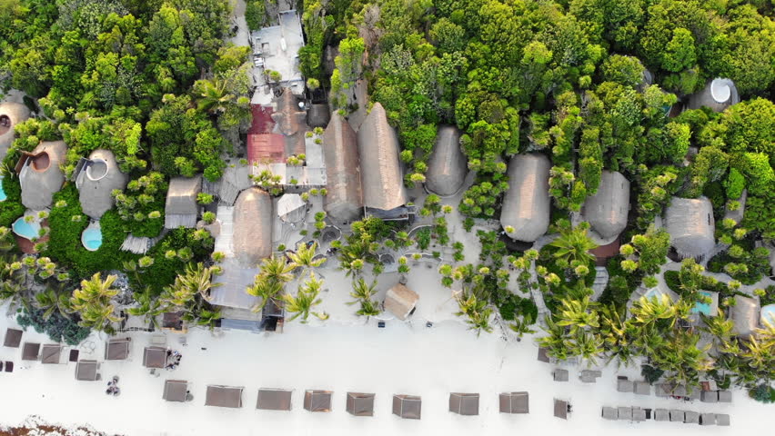 Looking down at white sandy Tulum beach at sunset, Quintana Roo, Mexico