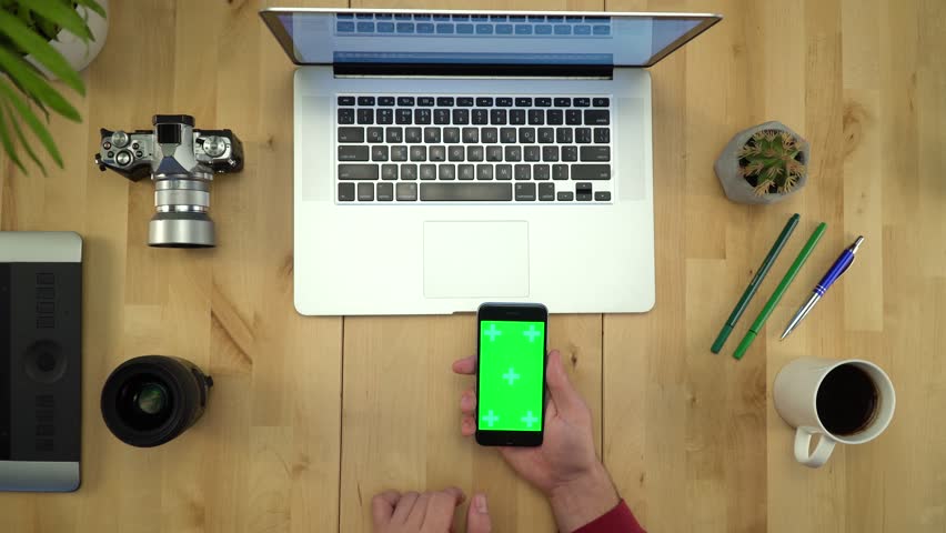 Man Using Phone With Green Screen, Working At Table Flat Lay 