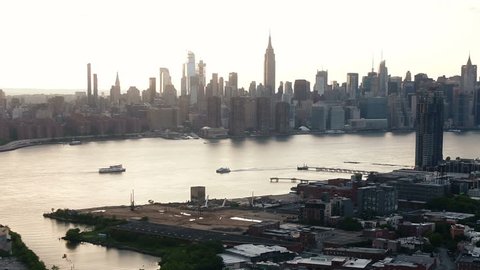 Brooklyn aerial moving toward East River and Manhattan skyline New York City NYC in 1080 HD