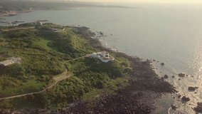 Aerial video of Fugueijiao Lighthouse,  Shimen District, New Taipei, Taiwan.