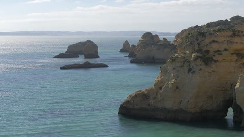 Lagos, Portugal - May, 2017: Rocks and cliffs in the sea