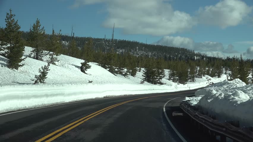 Snowy road to Yellowstone National Park, Wyoming USA