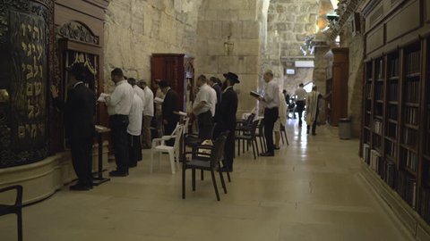 Jerusalem, Israel - August, 2017: Jewish men praying and swaying
