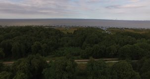 4K cloudy day aerial drone video of beautiful vintage architecture of Znamenka Estate, green park and palace near Peterhof center, in the suburbs of Saint Petersburg, the Russia's northern capital