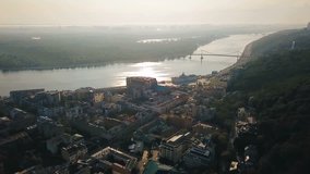 Kiev Kiyv Ukraine aeriel video footage. Camera moves from river Dnepr to Andriyivskyy Descent and St.Andrew's Church.