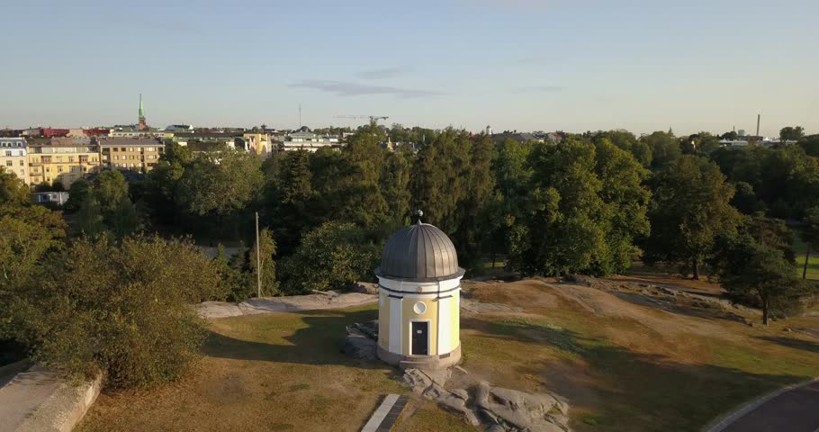 4K sunny summer early morning aerial video of Kaivopuisto Park with Ursa Observatory near Helsinki Baltic Sea Finnish Bay lagoon, Harakka Island in the capital of Finland Suomi, northern Europe