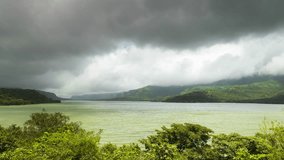 A monsoon storm is passing over the Mulshi dam, Maharashtra, India. 