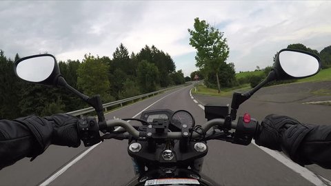 riding a motorcycle with gopro's chesty