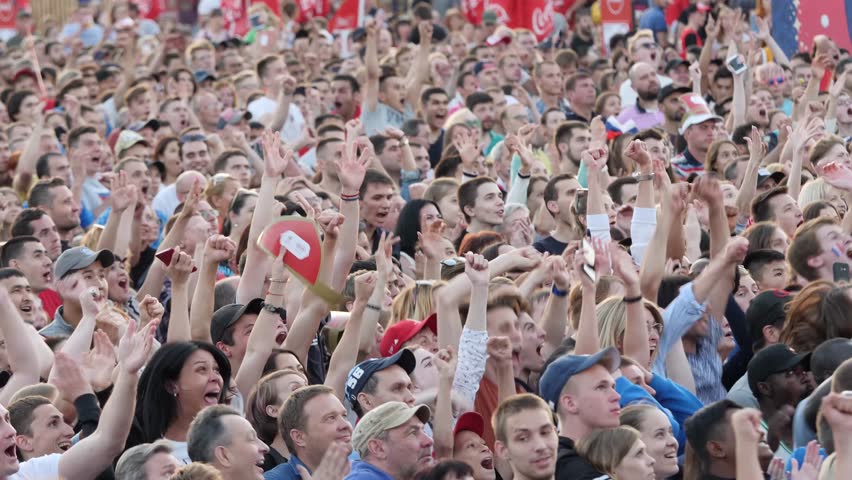 Yekaterinburg, Russia - June, 2018: fans of football in the fan zone. FIFA World Cup 2018. Fans in fan zone watching the world Cup in Russia