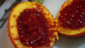 Gac fruit cut open, red healthy antioxidant food video