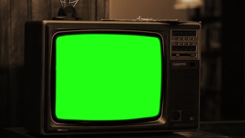 Vintage TV with Green Screen. Sepia Tone. Zoom Out. You can replace green screen with the footage or picture you want. You can do it with “Keying” effect in After Effects. | Shutterstock HD Video #1015770868
