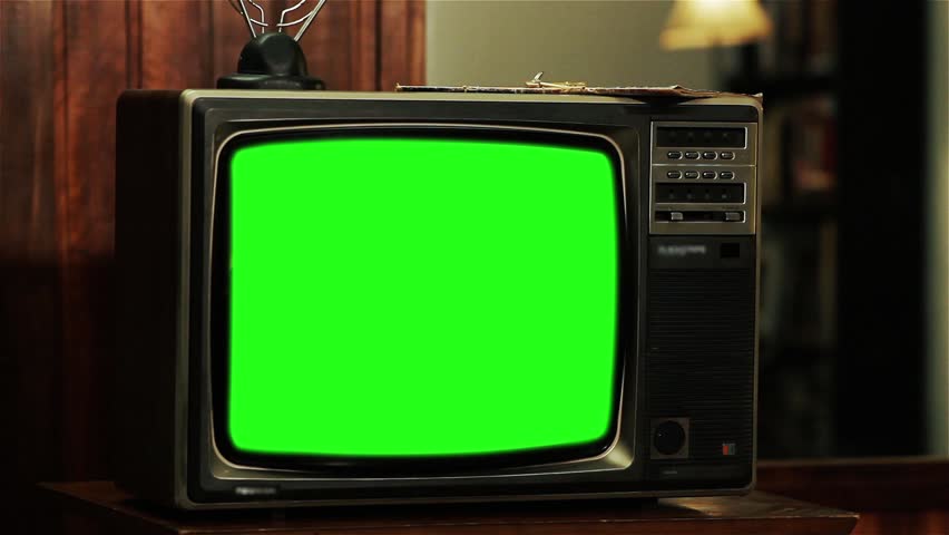 Vintage TV with Green Screen. Red Tone. Zoom In. You can replace green screen with the footage or picture you want. You can do it with “Keying” effect in After Effects. | Shutterstock HD Video #1015771645