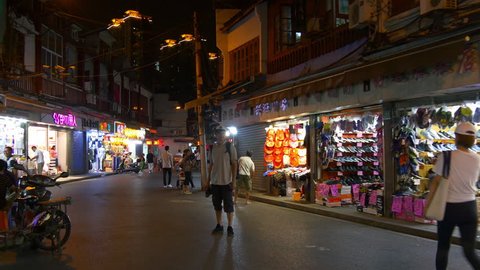 SHANGHAI, CHINA - SEPTEMBER 18 2017: night shanghai city center shopping street walking panorama 4k circa september 18 2017 shanghai, china.