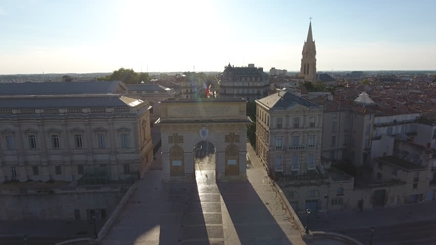 Drone flying through the Arc de Triomphe in Montpellier. One of the gates of the city