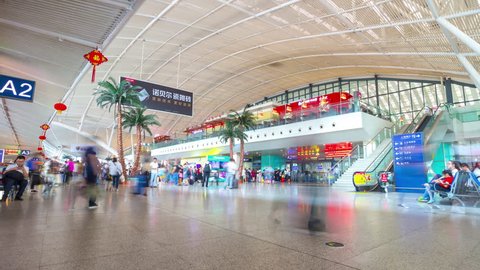 WUHAN, CHINA - SEPTEMBER 25 2017: day light wuhan city main railway station crowded hall inside panorama 4k timelapse circa september 25 2017 wuhan, china.