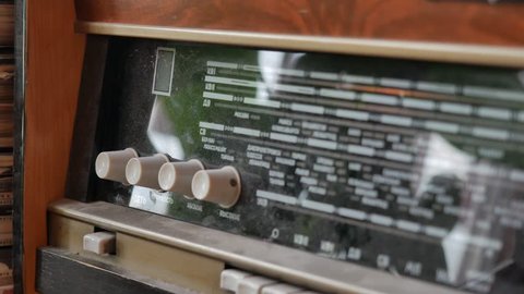 Adjustment of sound, radio waves. The old radio.