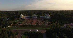 4K afternoon aerial video of beautiful vintage architecture of Grand Menshikov's Palace in Oranienbaum (Lomonosov) and green park near Peterhof center, in the suburbs of Saint Petersburg, Russia