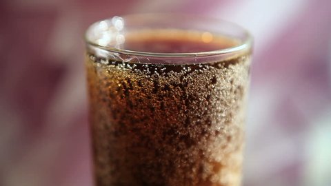 Cola soft drink bubbles, soda close-up