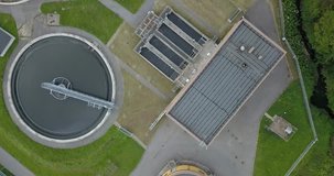 4K afternoon high quality aerial video view of water reclamation plant with factory recycling ponds near Peterhof town center, in the suburbs of Saint Petersburg, the Russia's northern capital