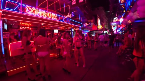 BANGKOK,  THAILAND - CIRCA AUGUST 2018 : View of walking SOI COWBOY street near Asok train station.  This street is famous for night spot.