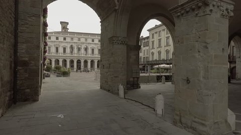 Aerial drone footage view OF Bergamo, historical buildings and towers  of Old city, in Italy // no video editing
