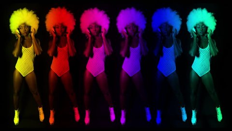 beautiful african female model in large afro wig dancing in white lingerie and headphones. multiple instance of the same model used to make cool abstract visuals