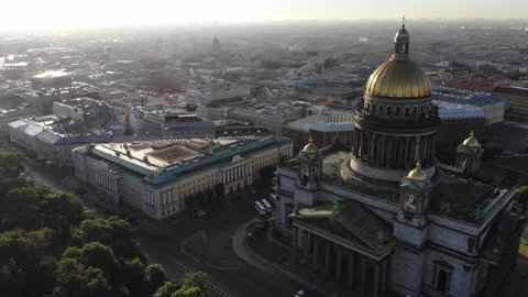 Flight around Saint Isaac's Cathedral. Morning Aerial view of Isaakievskiy Sobor in Saint Petersburg.