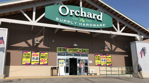 LOS ANGELES, Sep 1, 2018: A truck drives past the entrance to an OSH Orchard Supply Hardware store, which is surrounded with liquidation signs. The chain is set to close for good on October 20th