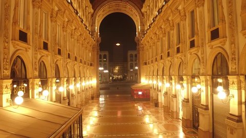 Aerial footage drone view Gallery Vittorio Emanuele in MIlan shopping italy during night  // no video editing