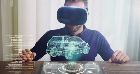 An engineer designs an electric car using sophisticated and futuristic programs with holography. Concept of: cars, future, project and augmented reality.