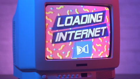 Loading the internet on an old vintage computer screen from the 90s. Retro style concept of the World Wide Web early moments.